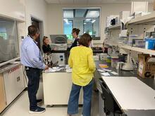 A group of people working in a laboratory