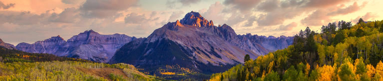 Wide view of Colorado mountains near sunset